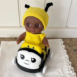 Lil’ Cutesies Baby Doll with Yellow Bee Ride-On Car. Like new!